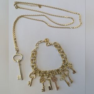 EVC RJ GRAZIANO GOLD TONE & PINK CRYSTAL NECKLACE & BRACELET SET